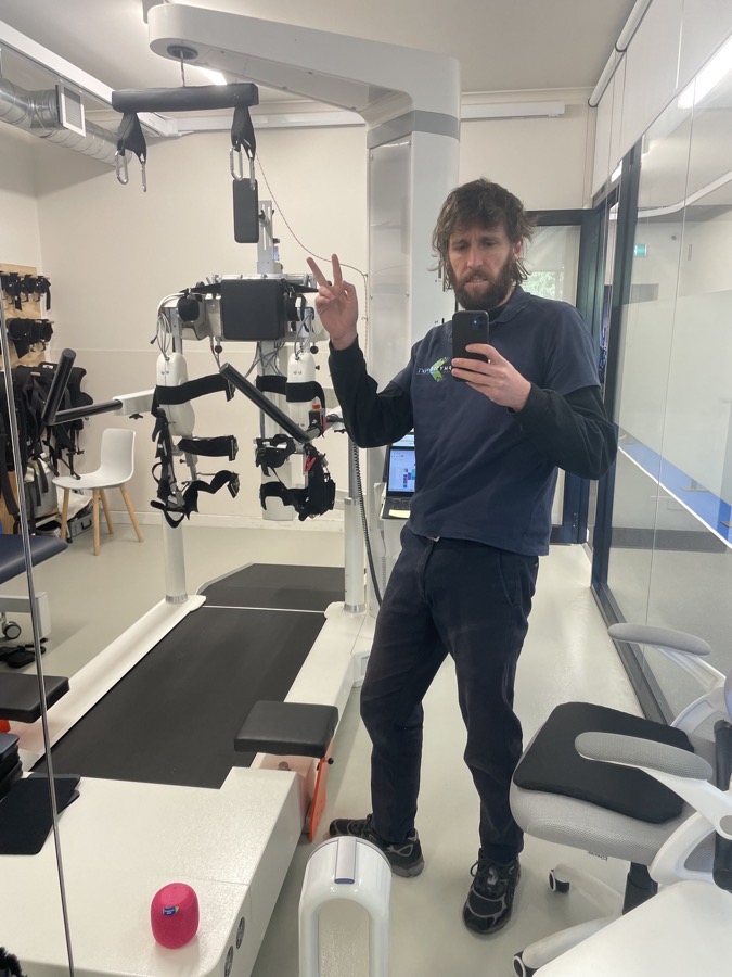 Sam in a neurological rehabilitation clinic with the Lokomat gait-training machine